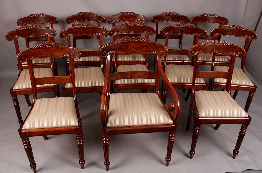 Fine and Rare Set of 12 Plus one Carver Georgian Dining Chairs