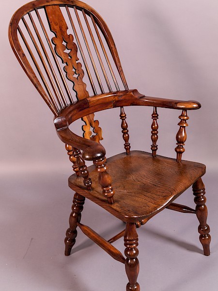 A Good Worksop Broad Arm Windsor Chair in Yew Wood