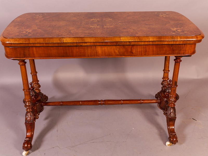 A Superb Victorian Games Table in Burr Walnut with inlay of Box Wood,
