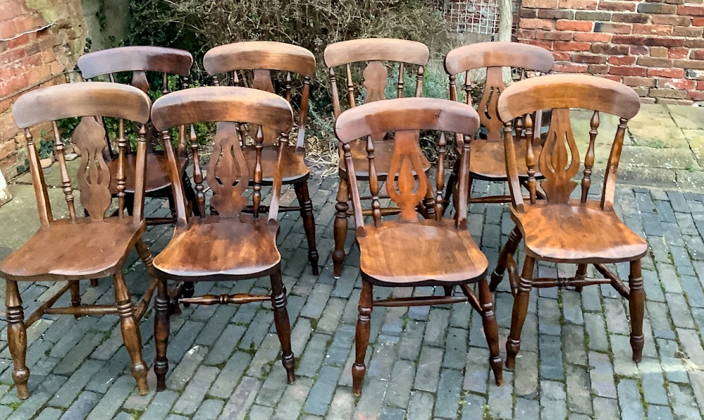 A Harlequin set of 8 fiddle back Kitchen Chairs