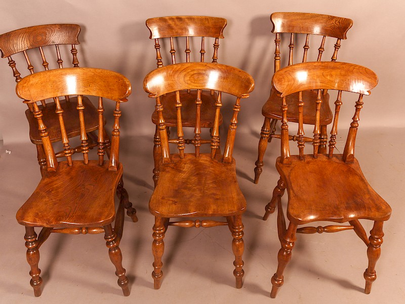 A Harlequin set of 6 Ash and Elm Kitchen Chairs