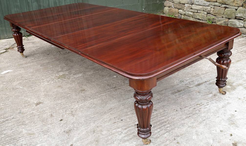 Early Victorian Mahogany Wind Out Extening Dining Table seats 12