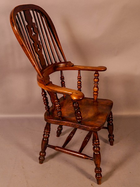 A Victorian Broad Arm Windsor chair Ash and Elm