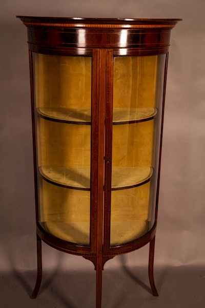 A Good Quality Display Cabinet with Bow Glass Doors