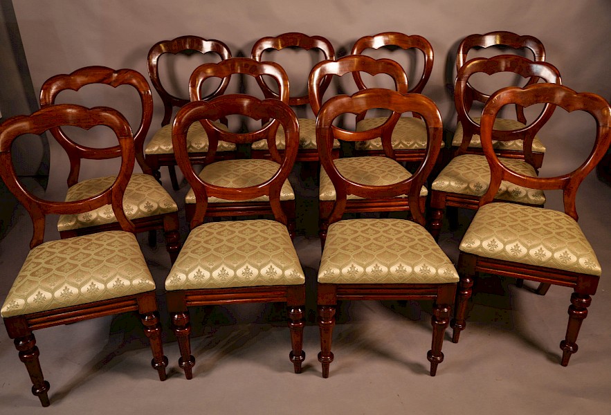 A Good Set of 12 Victorian Balloon Back Dining chairs