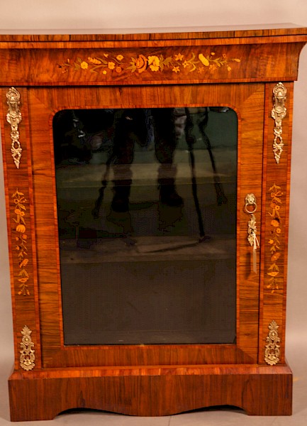 A Victorian Figured Walnut Pier Cabinet