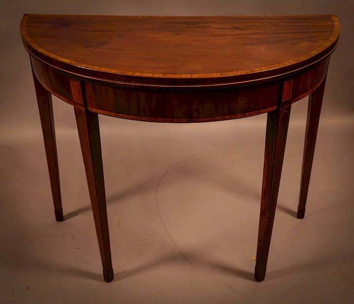 A Georgian Demi Lune Card Table
